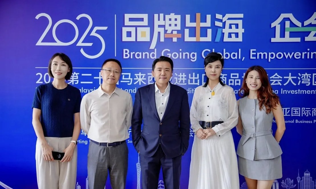 2025 品牌出海論壇：全承團隊與嘉賓於活動背板前合照